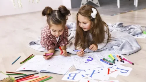 two-tiny-cute-girls-which-are-drawing-coloring-book-laying-floor-blanket-learning-letters_8353-10844_11zon